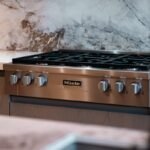 A standing gas cooker with an oven in a modern kitchen