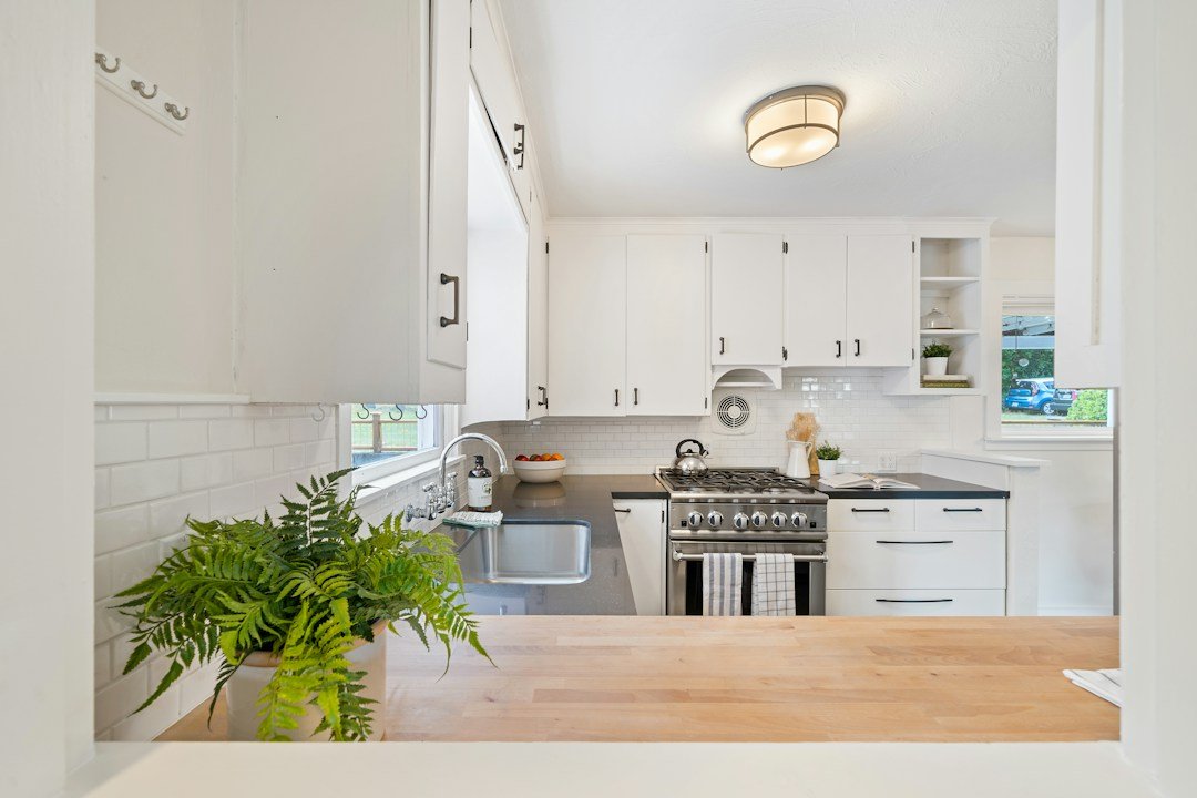 Home kitchen with a gas stove and open cooking space