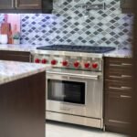 Modern gas cooker with multiple burners in a home kitchen