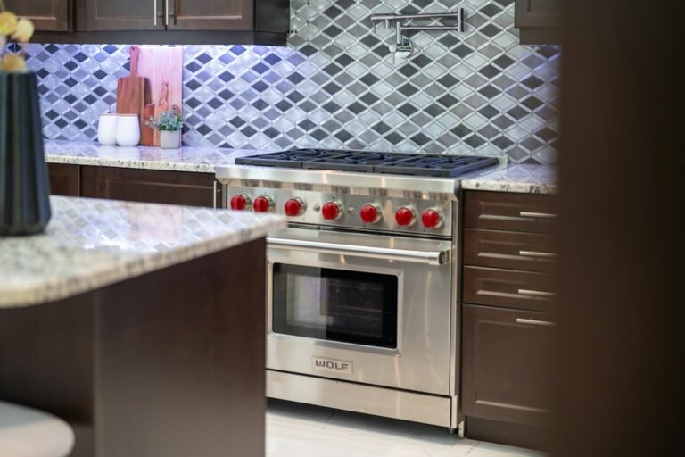 Modern gas cooker with multiple burners in a home kitchen