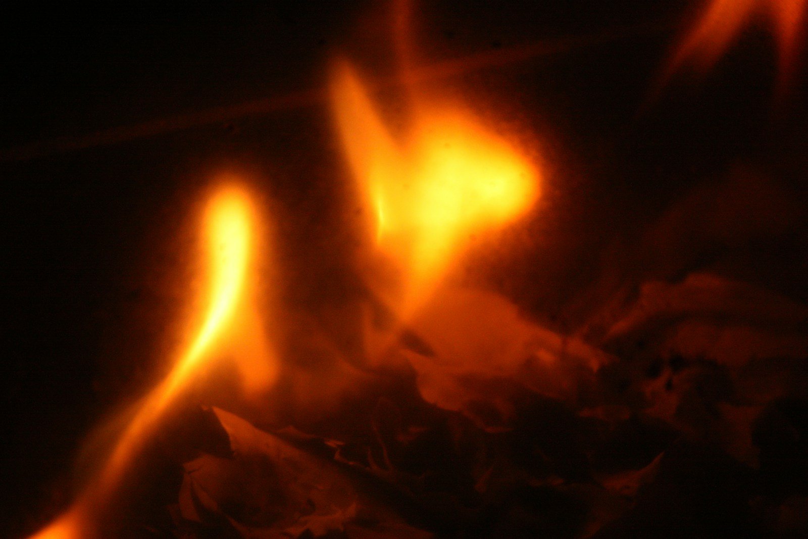 Yellow-orange flame on a gas stove burner